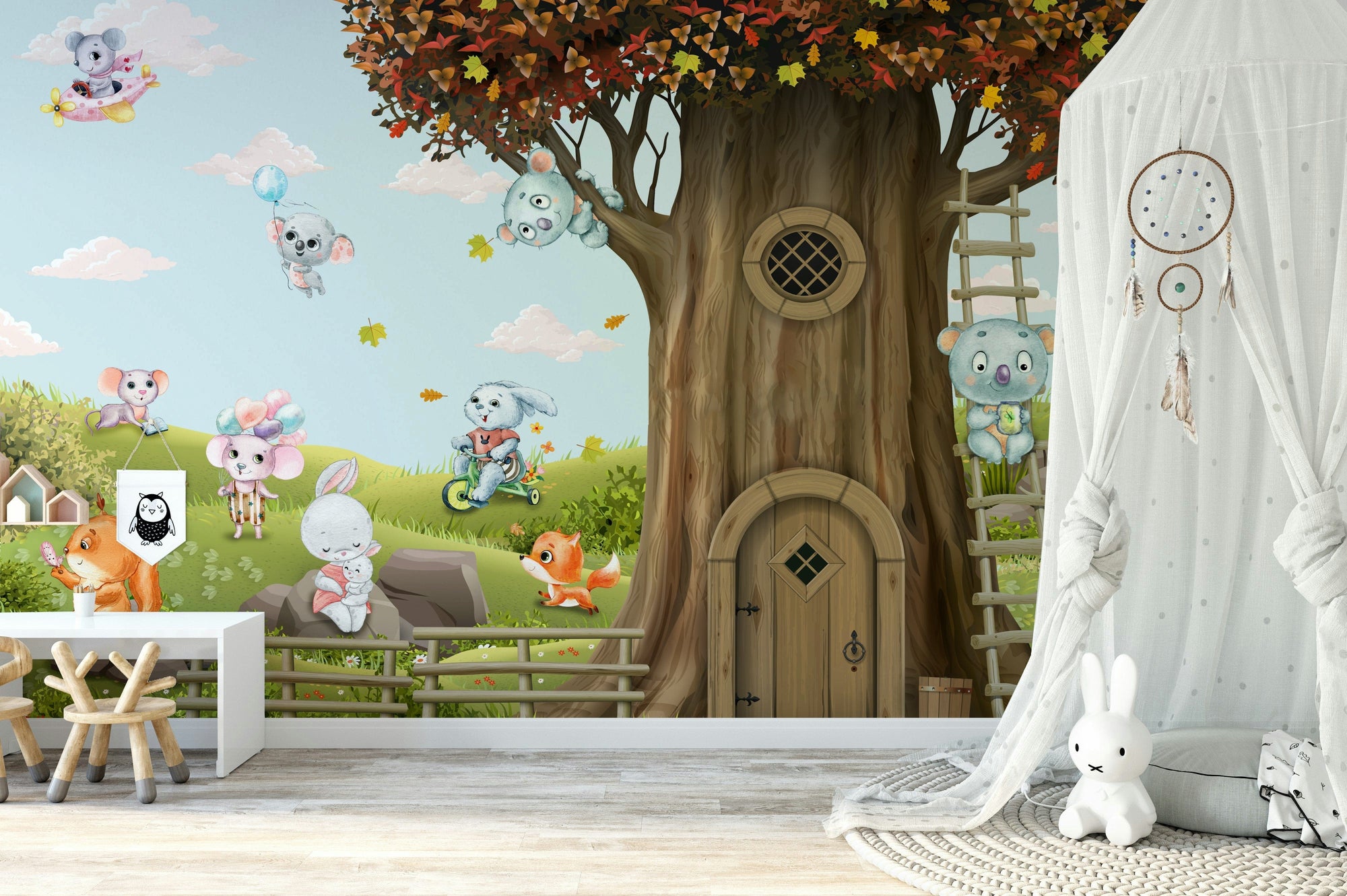 A cheerful wall mural with a whimsical, woodland animal design.

