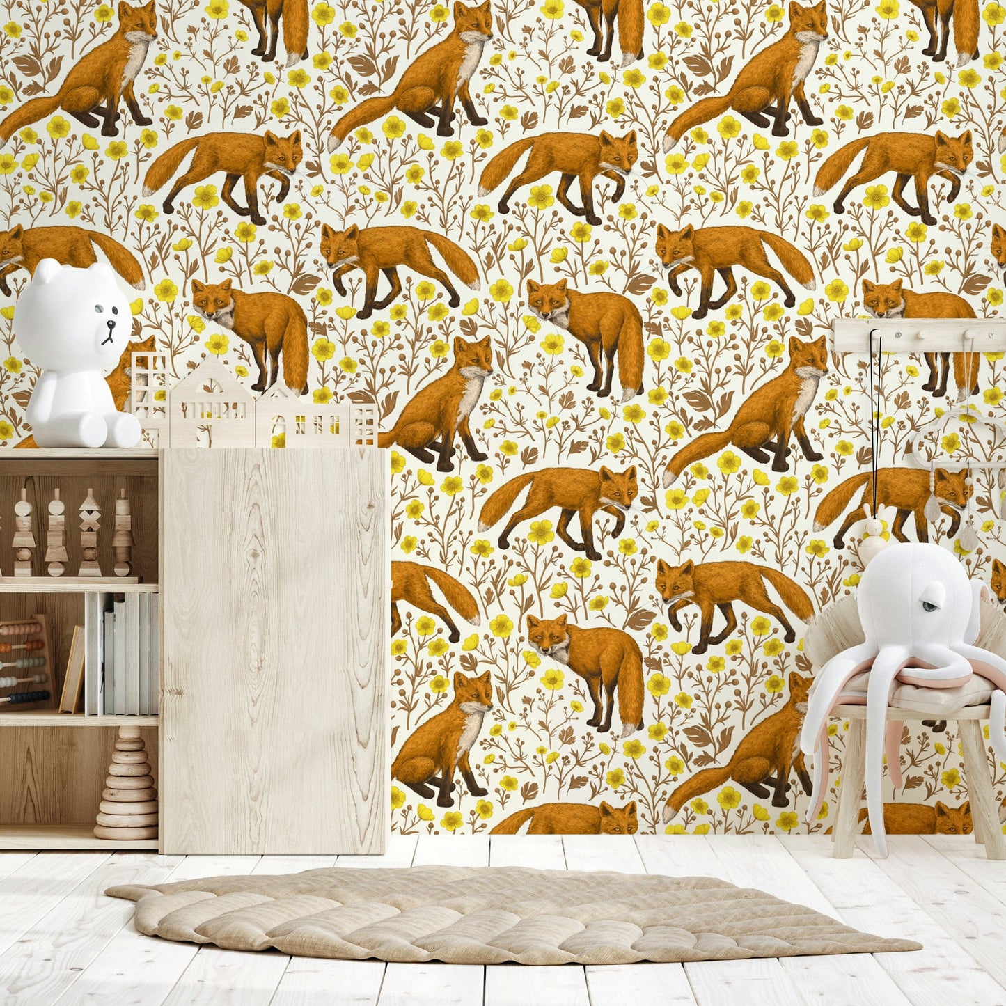 Foxes and Buttercups Wallpaper featuring playful foxes among yellow buttercup flowers on a natural white background.