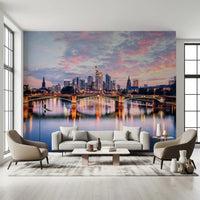 Frankfurt Dawn wallpaper mural of the lit Main bridge and skyline behind a beige sofa between two armchairs