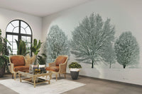 Beautiful frosty trees and snow-covered landscape captured in mural.

