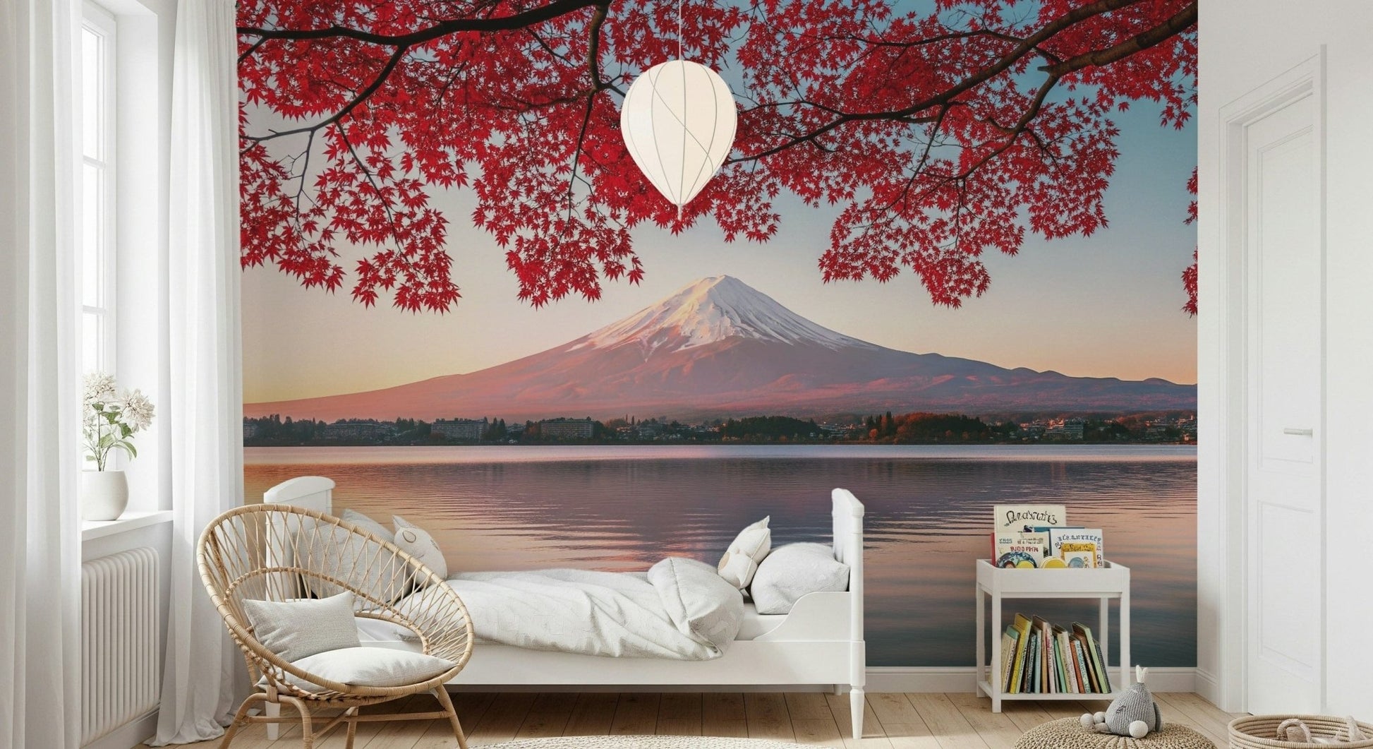 Modern coastal mural behind gray sectional, airy blue color wash