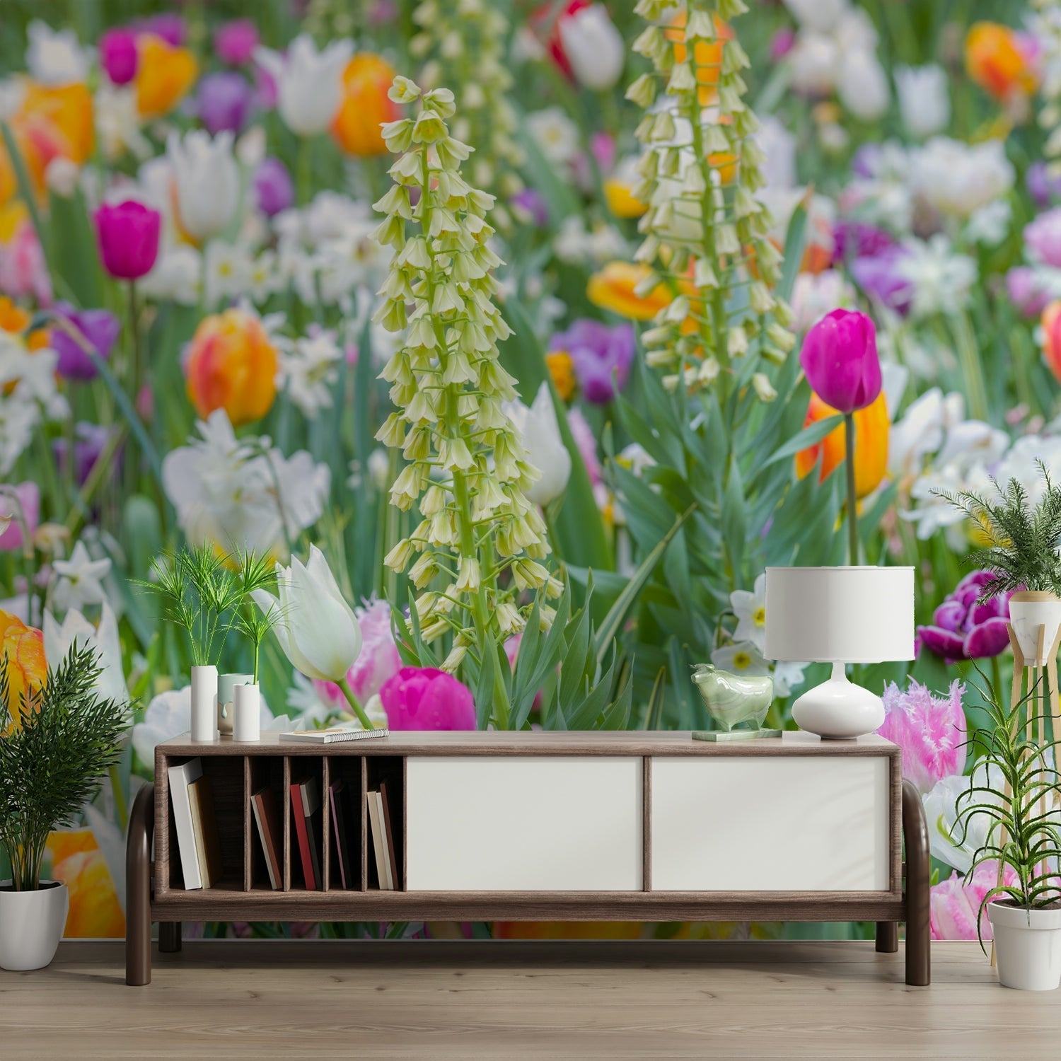 Garden Variety wallpaper mural of colorful pink and orange tulips behind a wooden console in an entryway with potted plants
