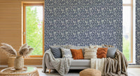 Decorative foliage wallpaper with intricate leaf clusters on a dark gray base.