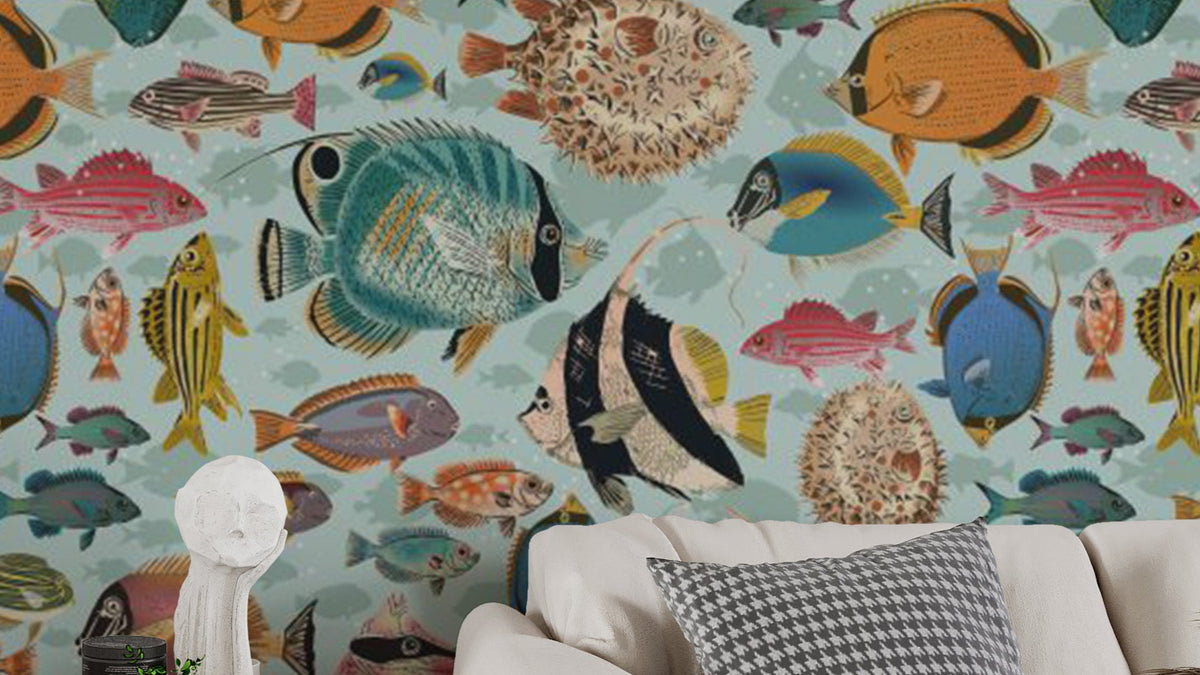 Oceanic Melody wallpaper mural of colorful tropical fish on pale blue water behind a cream living room sofa