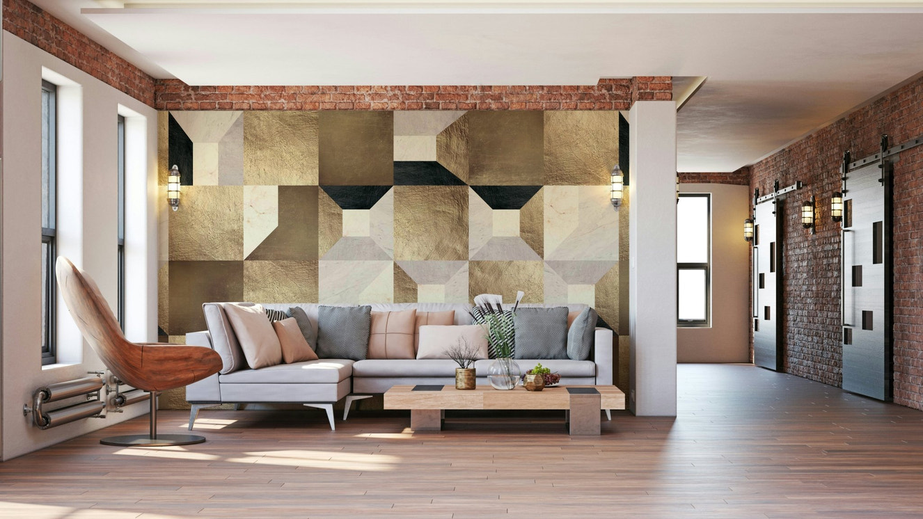 A modern wall mural with a repeating geometric pattern and a gilded effect.


