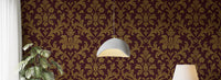 Gilded leaves peel and stick wallpaper with luxurious gold tones.