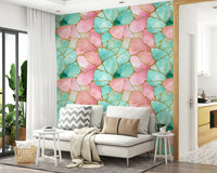 Decorative wall mural with abstract pink and turquoise water patterns accented in gold