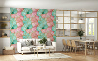 Luxurious wall covering with gilded gold details over pink and turquoise waves