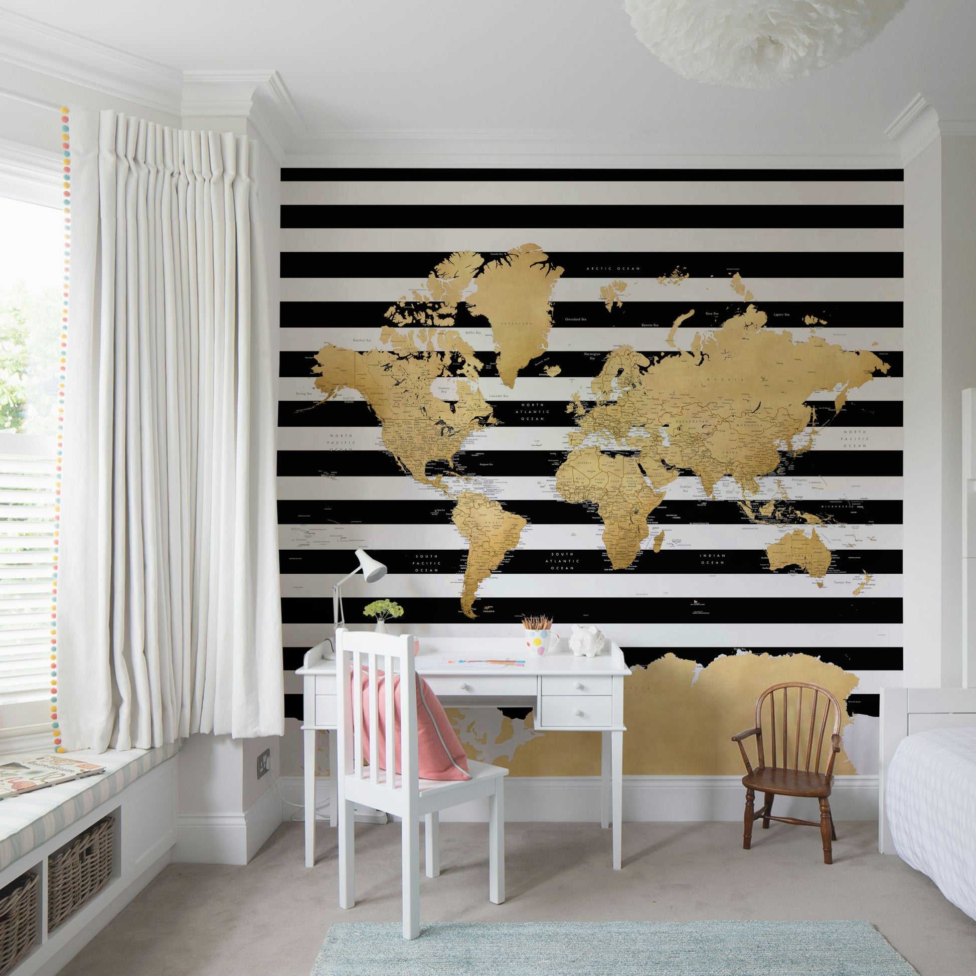 Gold continent design on black watercolor background

