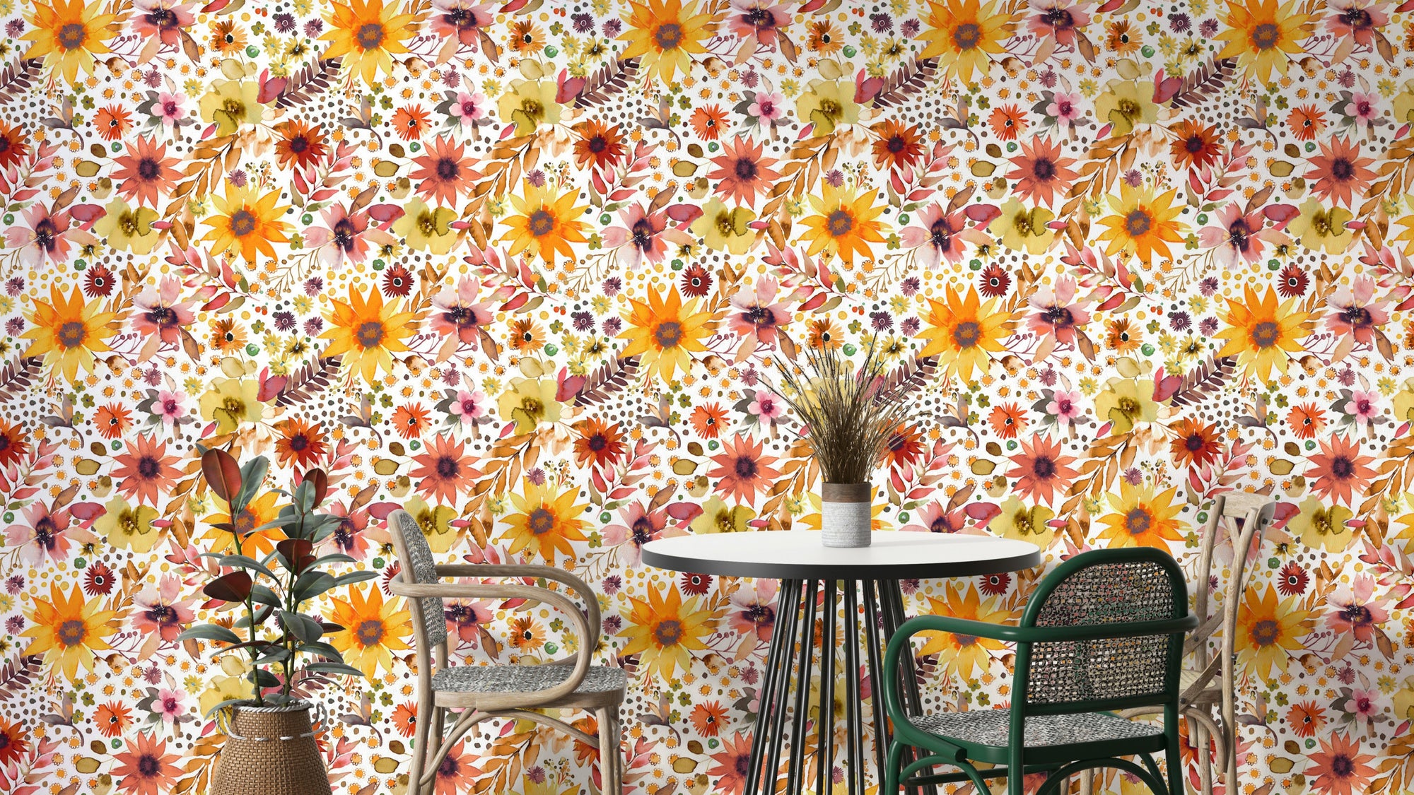 Big Sunflowers Floral Gold wallpaper behind a round bistro dining table with green and rattan chairs