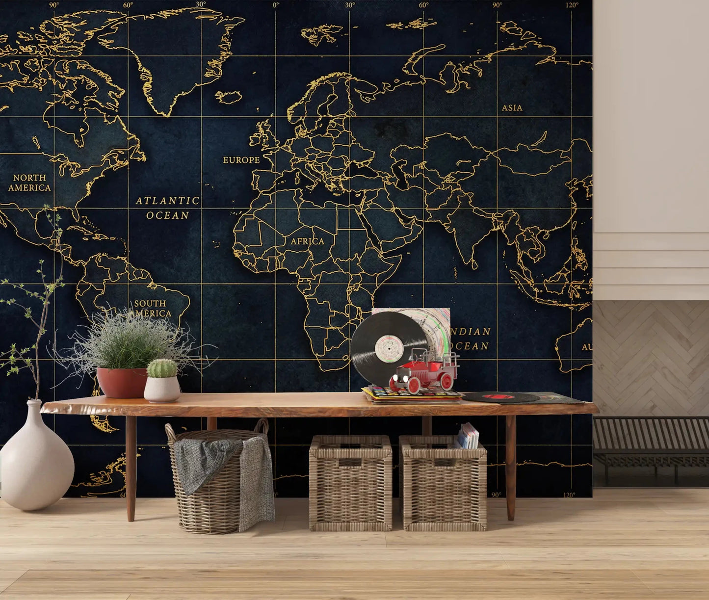 Golden atlas mural with world map grid and ocean labels