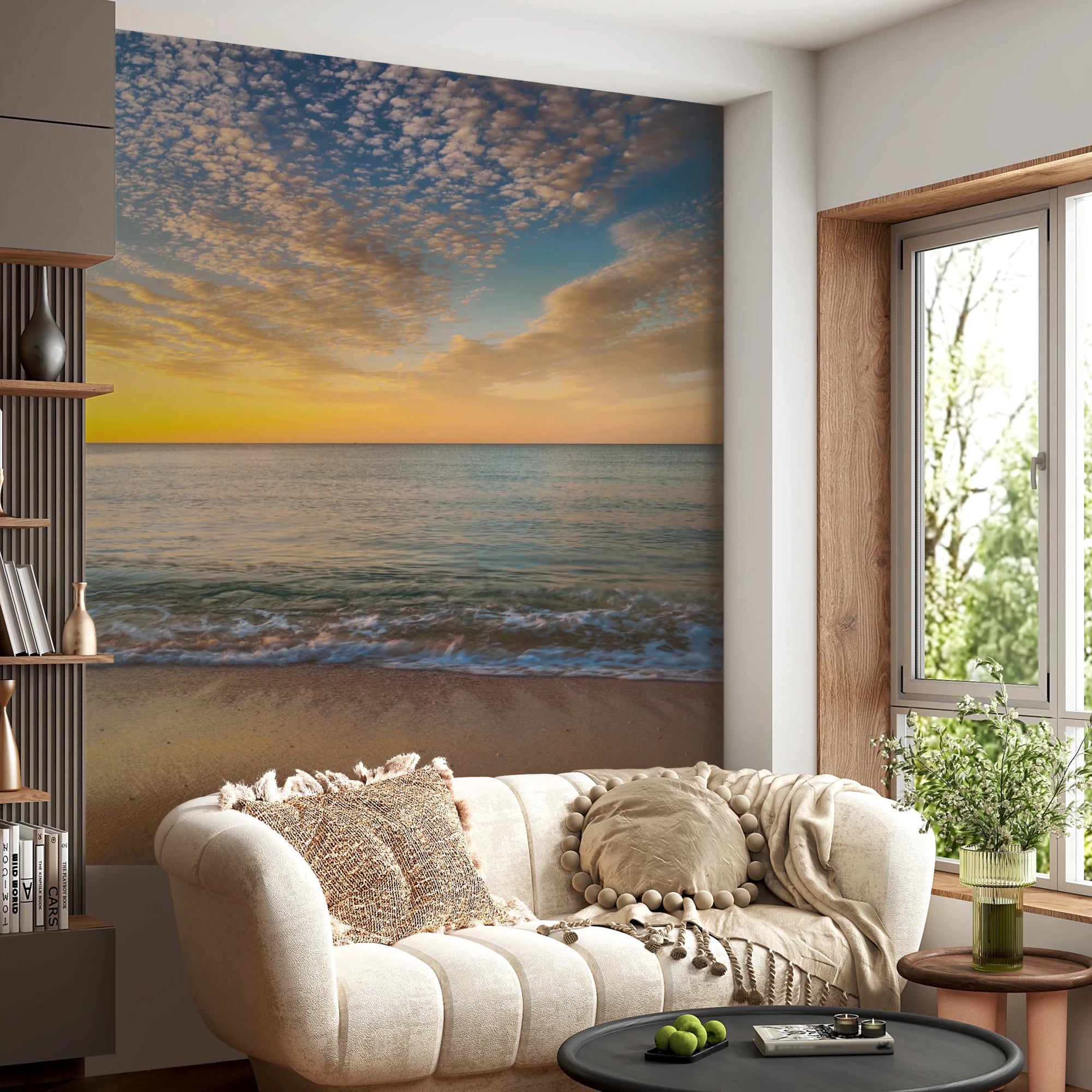 Golden Beach Sunrise mural of a glowing sea and clouds above a cream tufted sofa in a living room