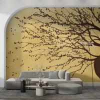 Reading nook with gold floral mural, warm colour accents
