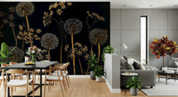 Artistic wallpaper with golden wildflowers and fluffy dandelions glowing against a black canvas.
