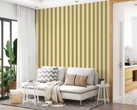 Luxury gold metallic striping on a neutral textured surface.