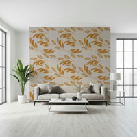 A minimalist leaf wallpaper with warm golden tones forming a subtle organic pattern.