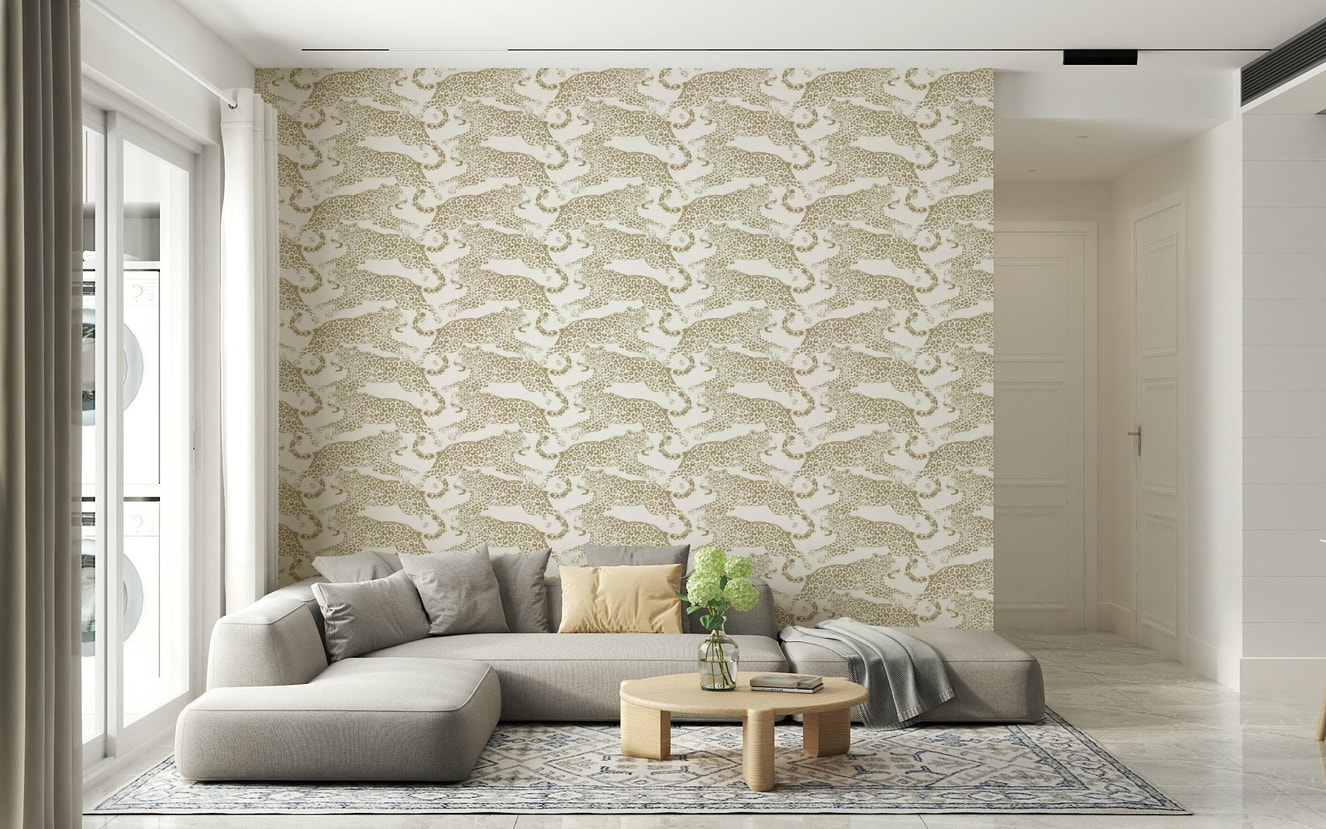 Glamorous golden leopard spot wallpaper adding texture and style to home decor.