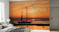Coastal Golden Horizon mural peaceful sea boat orange atmospheric colors.