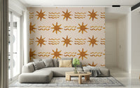 Abstract sun and gold wave design creating a bright, uplifting wall look.