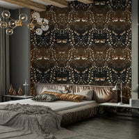 Moths and foliage mural wallpaper in muted hues

