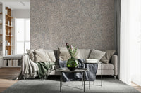 Contemporary wall covering featuring stacked stones with balanced textures