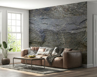 Decorative mural featuring smooth stone patterns resembling natural granite surfaces.