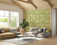Organic olive bloom wallpaper featuring stylized petals.
