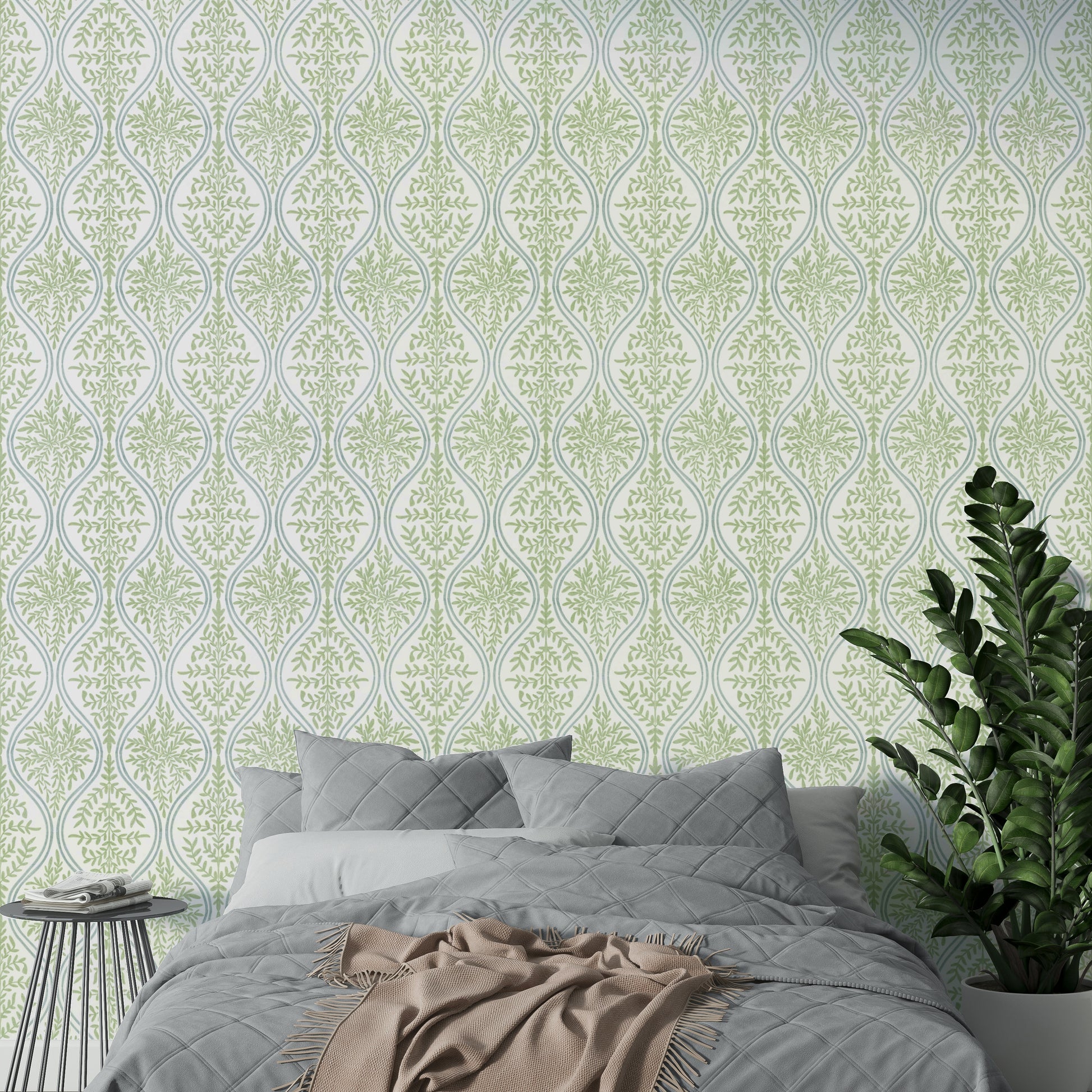 Textured green leaf damask wallpaper adding wall elegance

