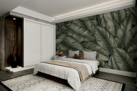 A peaceful wall mural with a tranquil scene of lush leaves.

