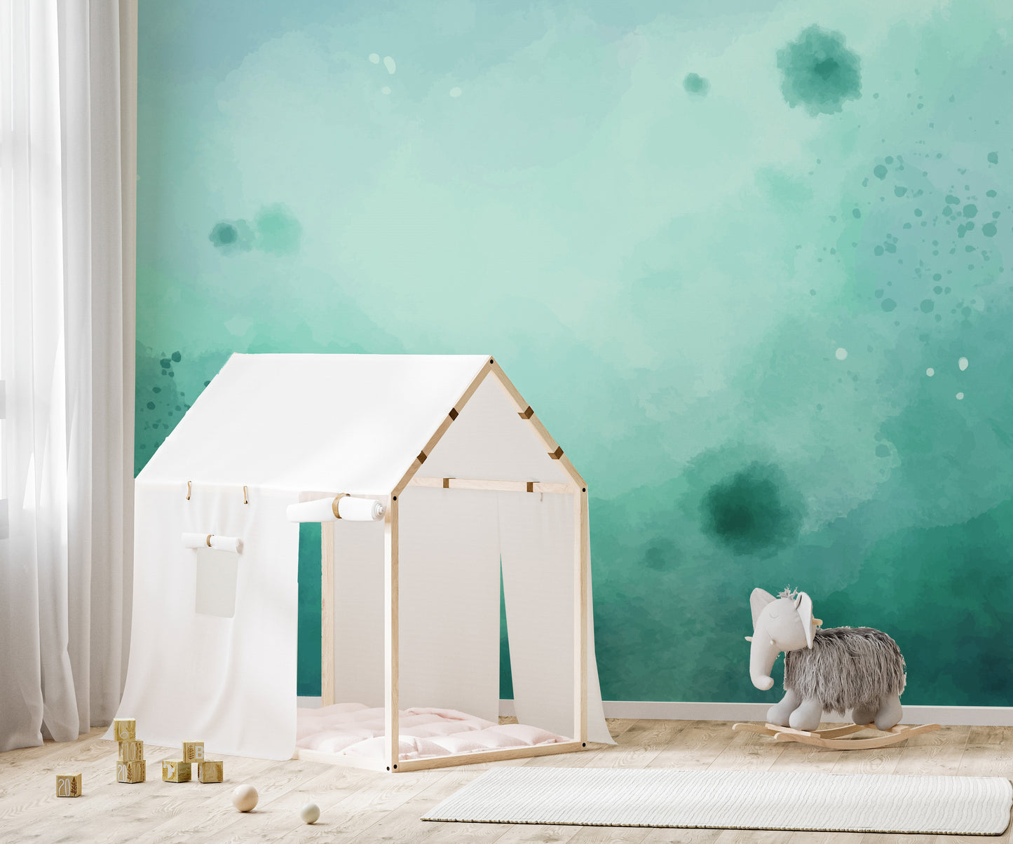 Soft watercolor green mural adding a natural vibe to walls.
