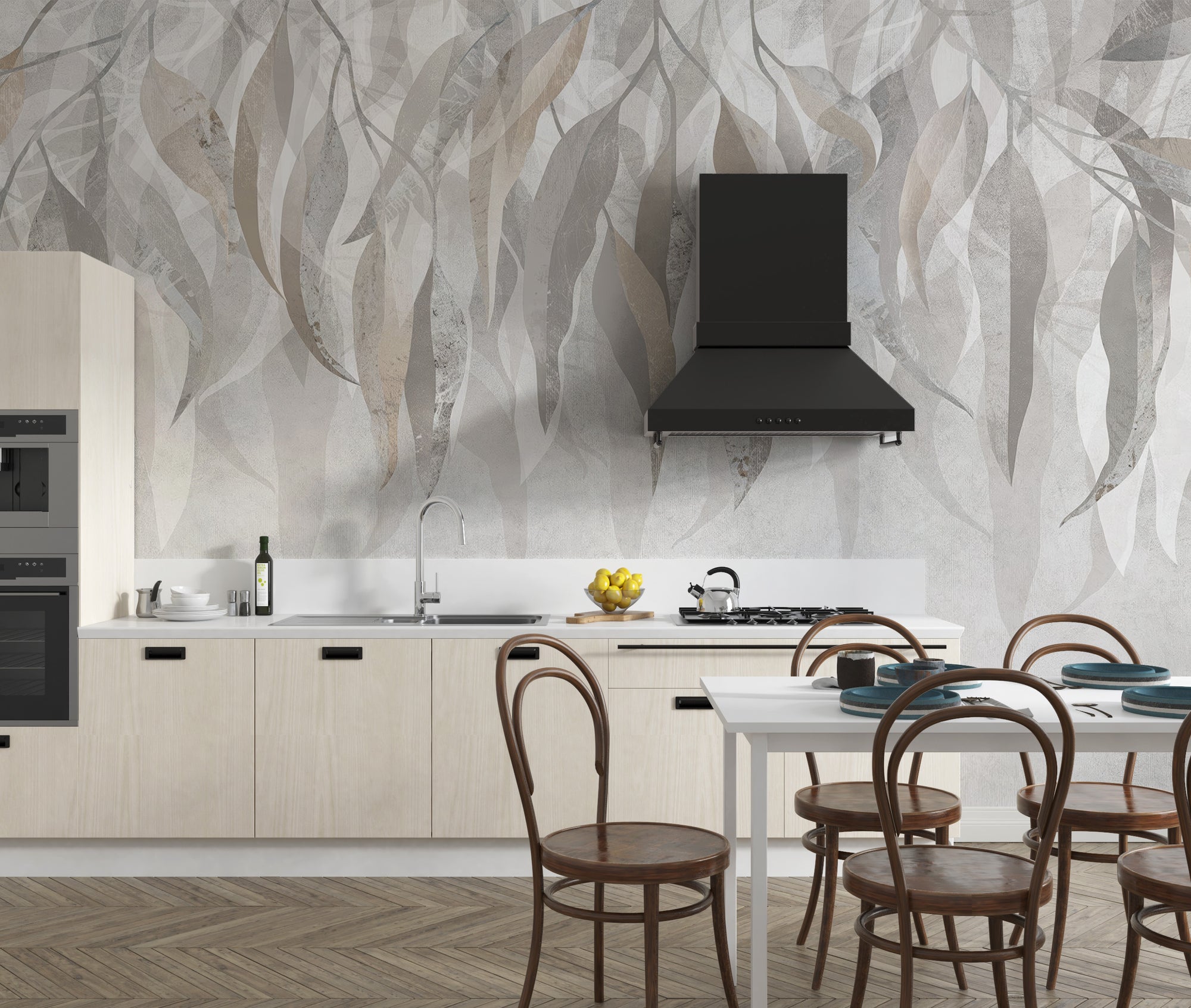 Grunge Gleam wallpaper mural with beige and grey leaves behind a cream kitchen with black range hood and dining chairs