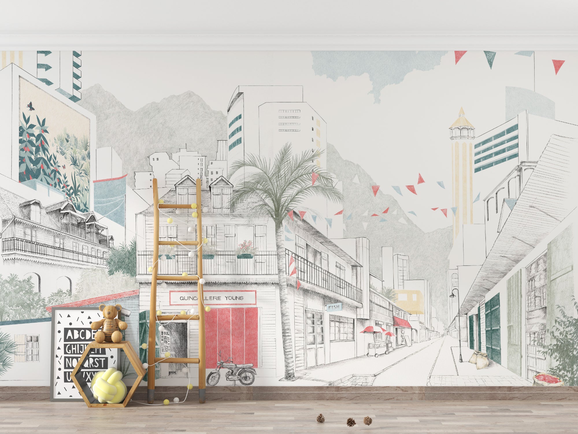 Hand-Drawn Urban Cityscape wallpaper mural in a playroom with a wood ladder shelf, teddy bear and alphabet art