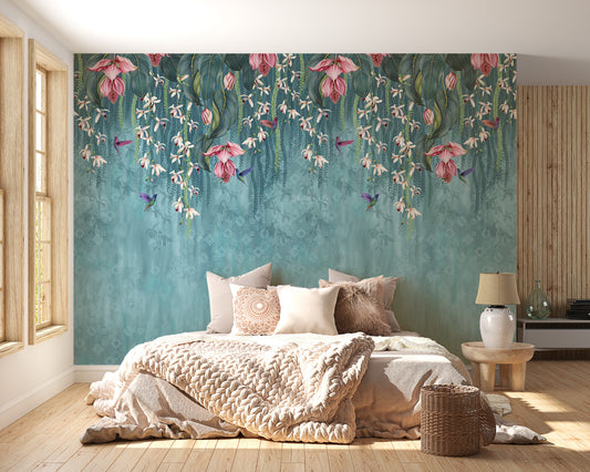 Hanging Pink Flower on Turquoise wallpaper mural styled as a living room feature wall behind a sofa and seating