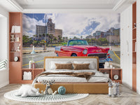 A close-up of the classic car and cobblestone street.

