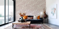 Classic floral wallpaper with soft pastel tones, ideal for enhancing a living room.