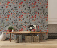 Subtle floral patterns on a landscape wallpaper for a living area.