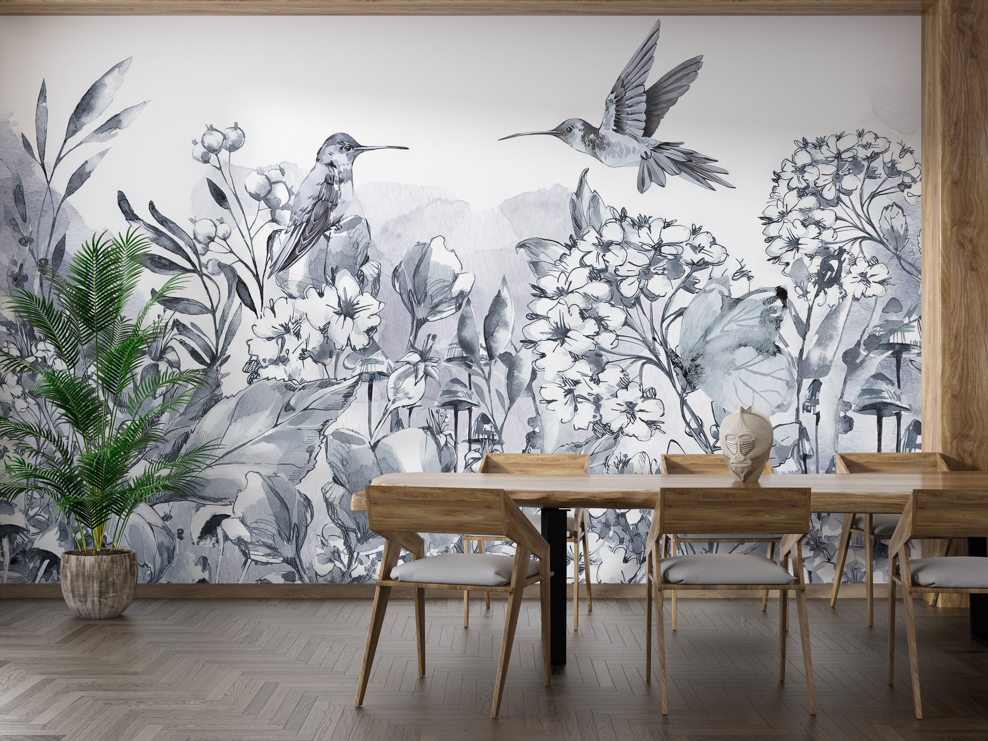 Hummingbird Garden wallpaper mural with gray watercolor birds and flowers behind a wood dining table in a dining room