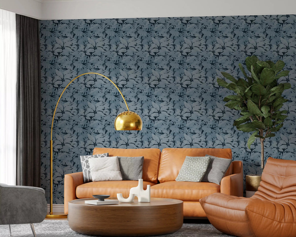 Repeating tropical foliage wallpaper in indigo and slate blue