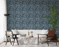 Blue botanical wallpaper with monstera leaves and tropical forms
