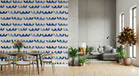 Artistic indigo watercolor wallpaper with layered, wave-like strokes.