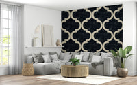 Dramatic black ogee wallpaper with subtle distressed texture