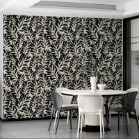 Hand-drawn charcoal leaf wallpaper for sophisticated decor.
