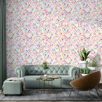 Multicolored ink splatter wallpaper with bleeding dots

