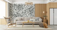 A contemplative dramatic splatter wallpaper mural for a feature wall.