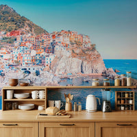 Artistic Italian Village wall mural highlighting hillside terrace dwellings.