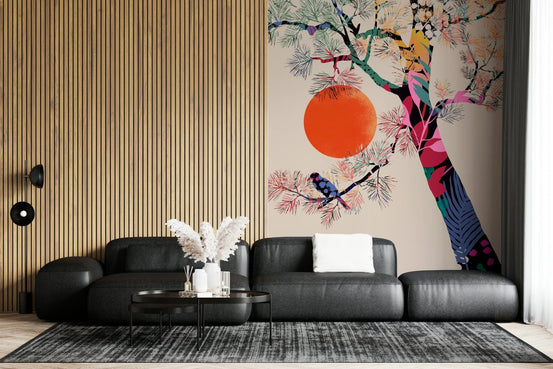 Japanese Summer wallpaper mural of a colorful pine tree and orange sun behind a black sofa in a lounge