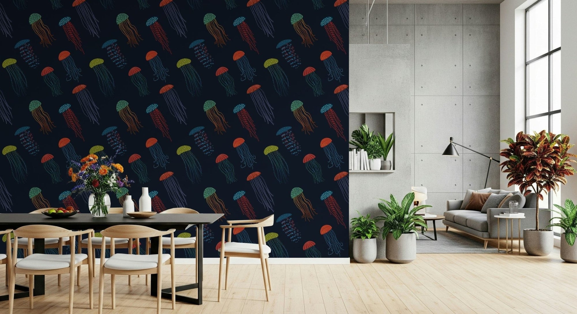 Jellyfish Parade wallpaper with colorful jellyfish on navy behind a black dining table and wood chairs