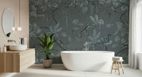 Whimsical mural depicting tropical trees and plants in serene blue tones