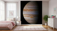 Space-themed Jupiter mural in home office, calm dark color palette