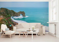 Modern dining room featuring a large coastal landscape mural
